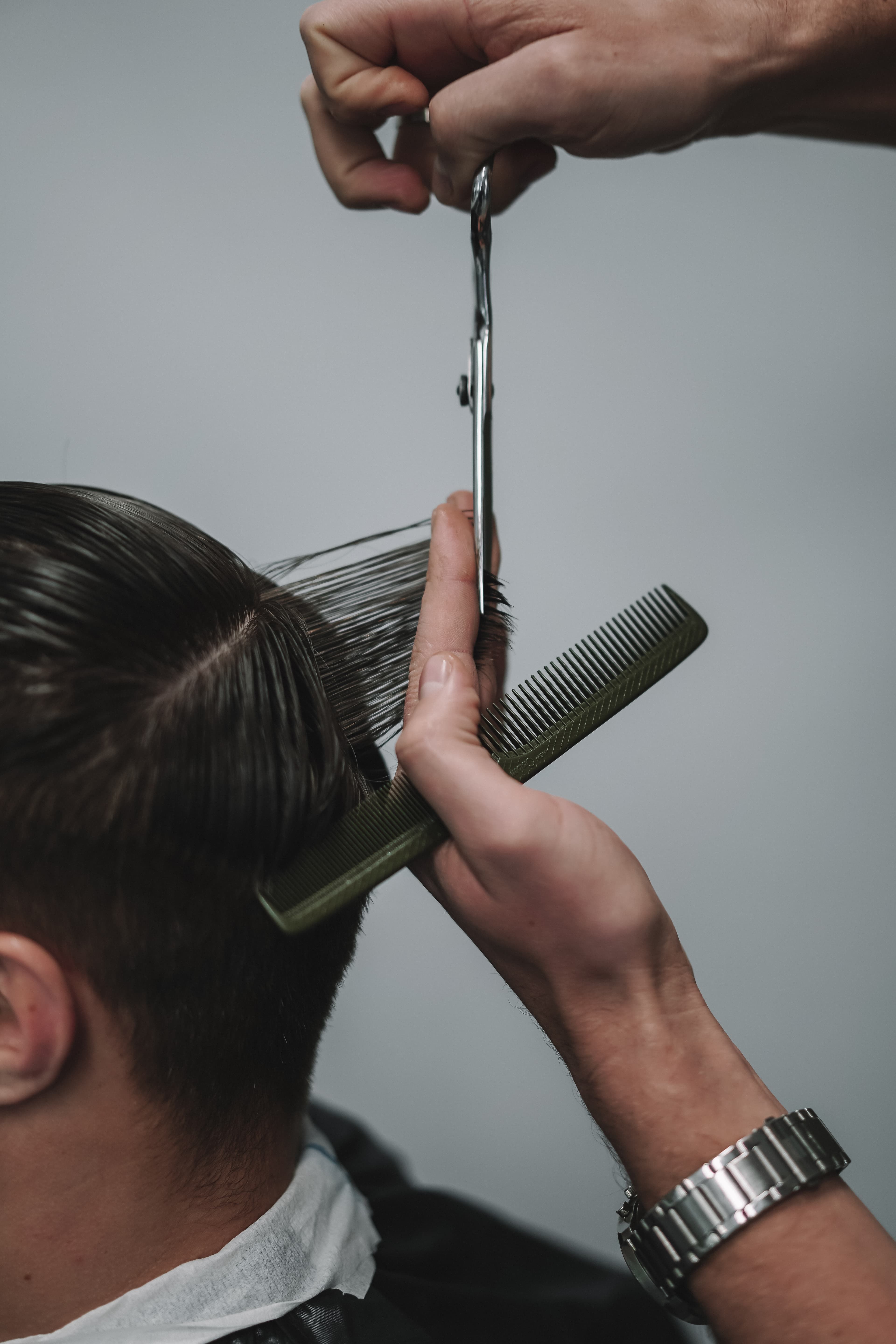 Men's haircut at Flash Barbershop Prague — barbershop detail