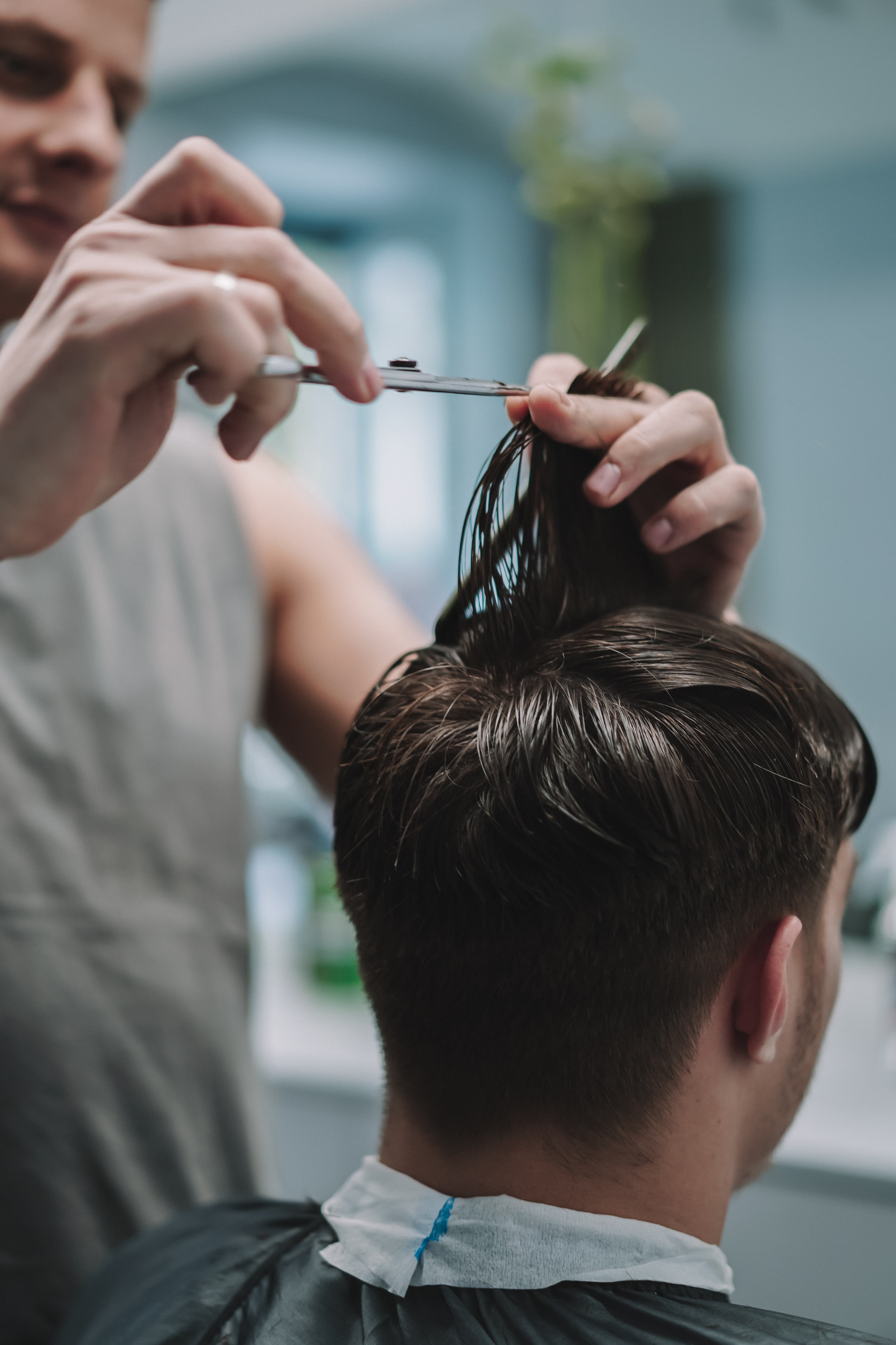 Men's haircut at Flash Barbershop Prague — barbershop interior